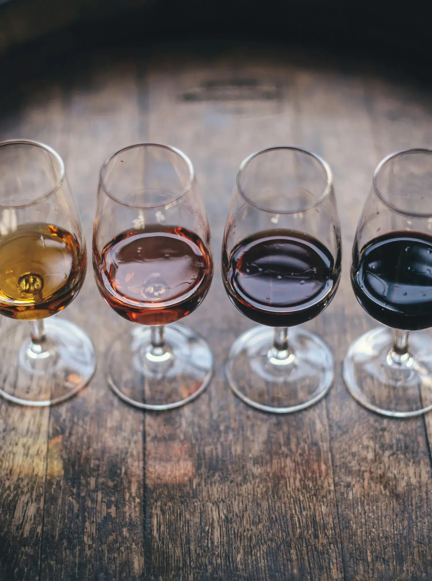 types-of-wine Four wine glasses with different types of wine in each