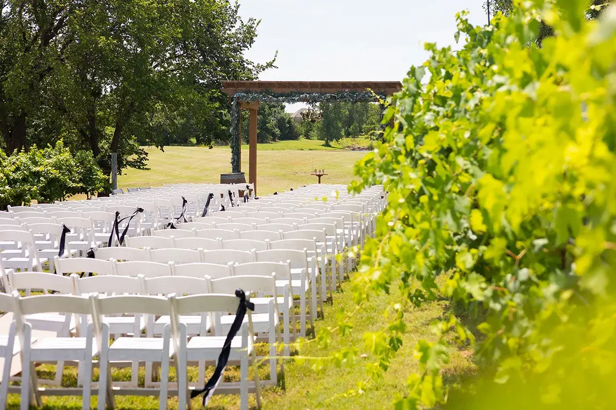 The ceremony setup with a pergola at Clauren Ridge