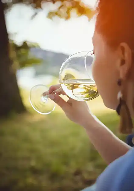 Woman sipping during a white wine tasting in Oklahoma
