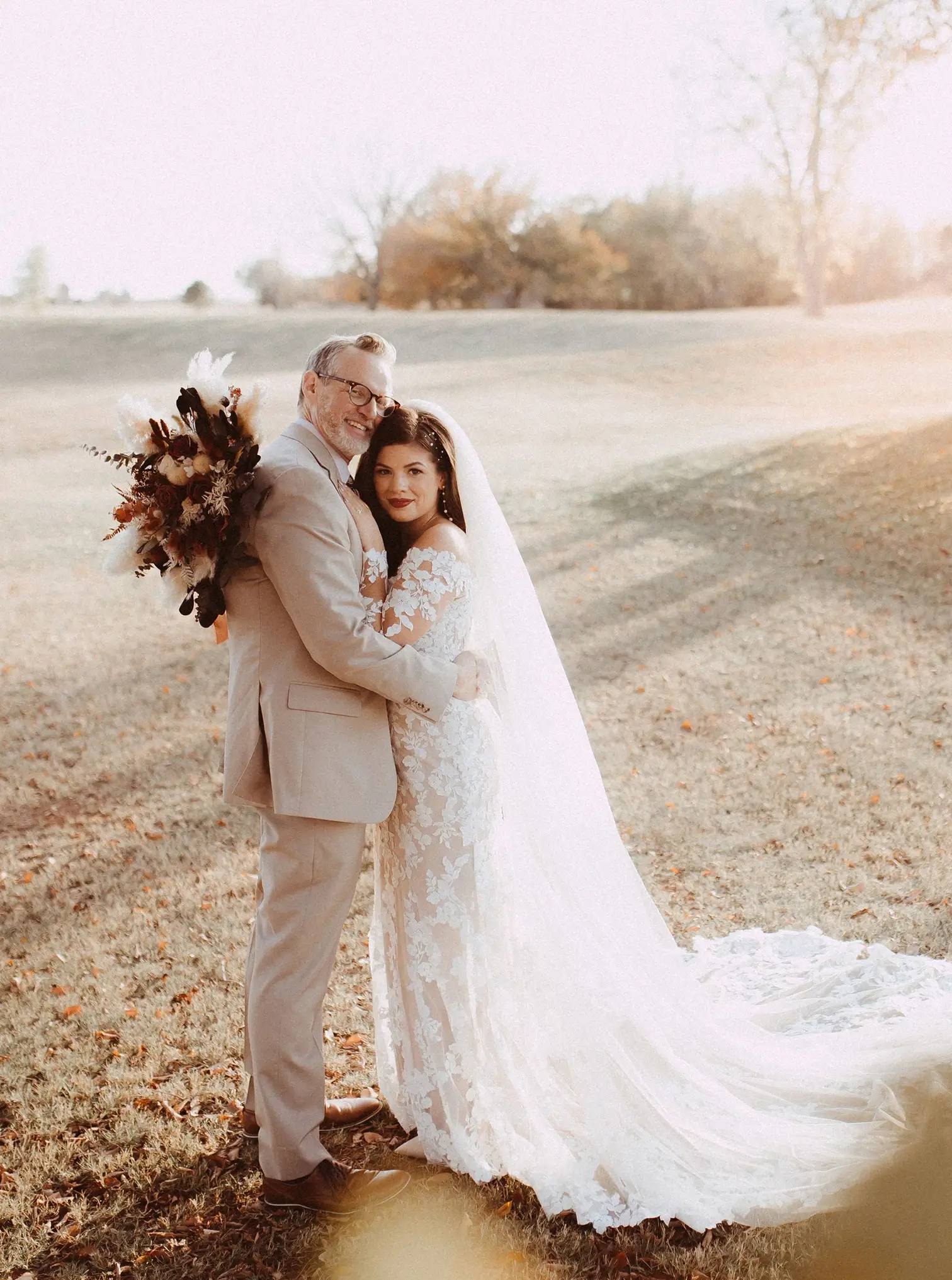 Celebrate Outdoors Bride and groom smiling outdoors